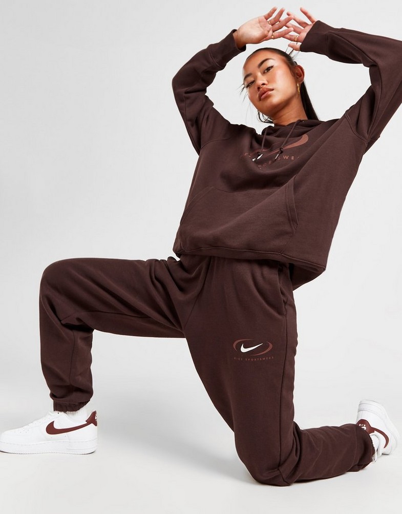 Жіночі штани NIKE ШТАНИ NSW PHNX FLC HR OS PANT PRNT FN7716-227 Коричневий