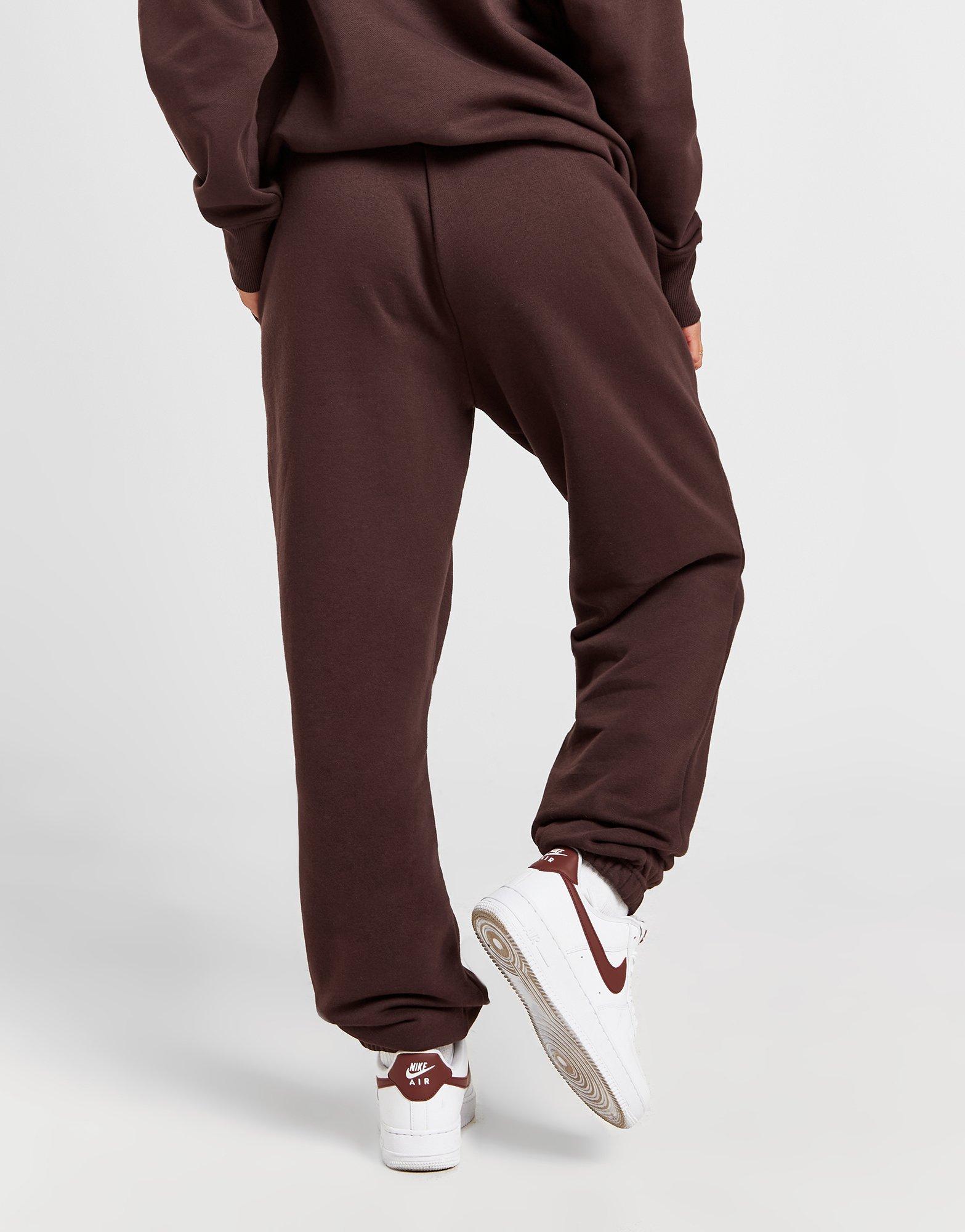 Жіночі штани NIKE ШТАНИ NSW PHNX FLC HR OS PANT PRNT FN7716-227 Коричневий