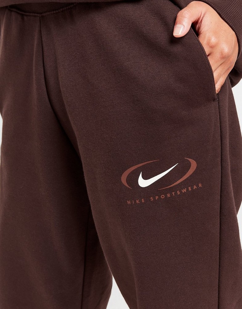 Жіночі штани NIKE ШТАНИ NSW PHNX FLC HR OS PANT PRNT FN7716-227 Коричневий