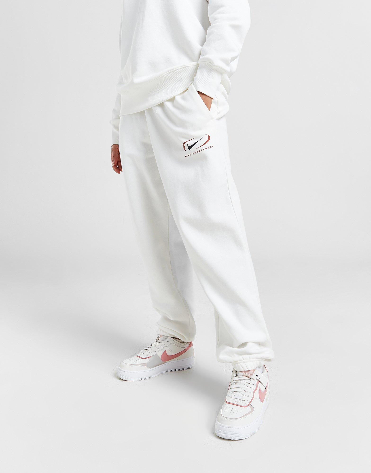 Moteriškos kelnės NIKE KELNĖS NSW PHNX FLC HR OS PANT PRNT FN7716-133 Rusva