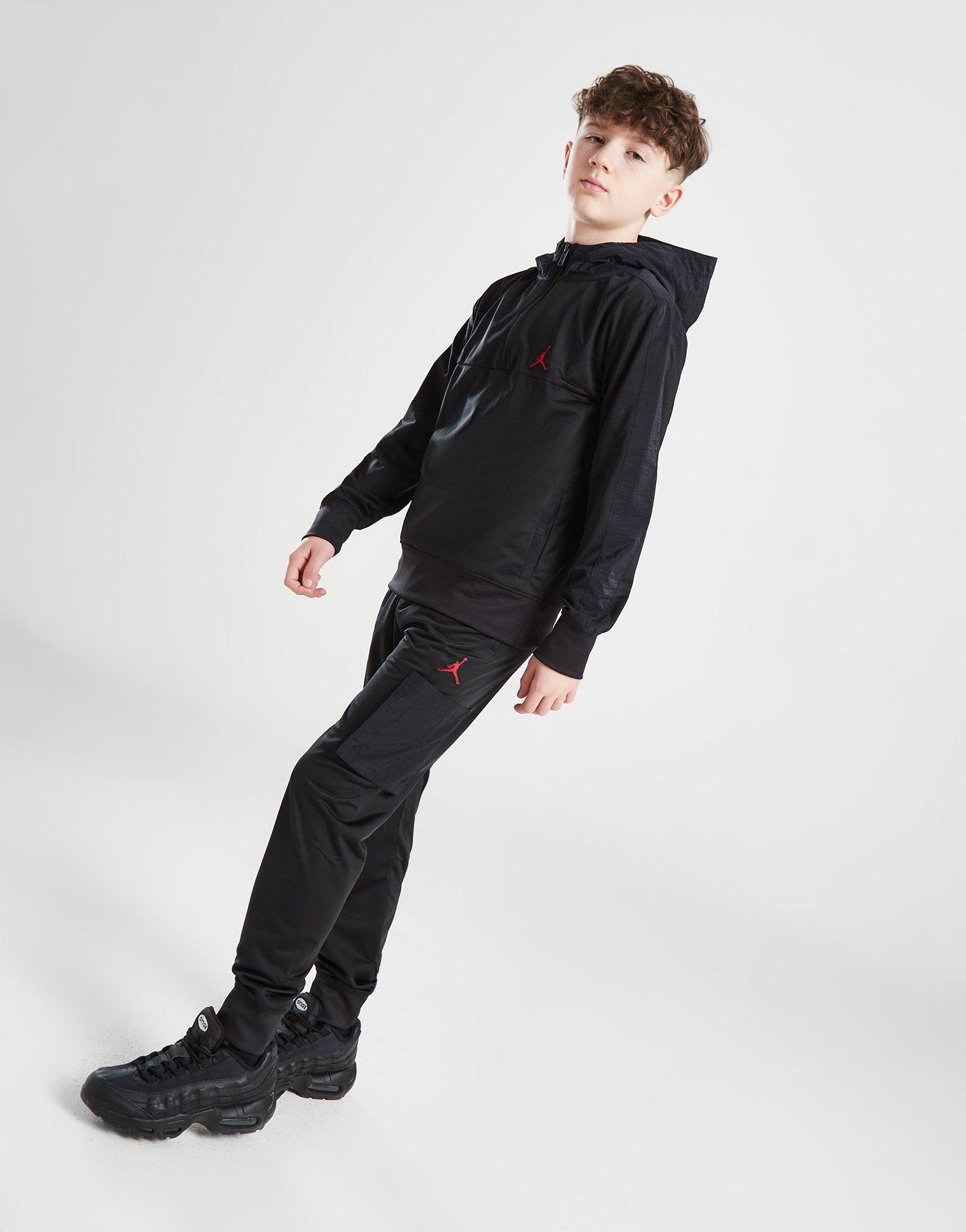 Vaikiški sportiniai kostiumai JORDAN KOMPLEKTAS WVN PNL CRGO OH SUIT BLK/RED B 95D036-023 Juoda