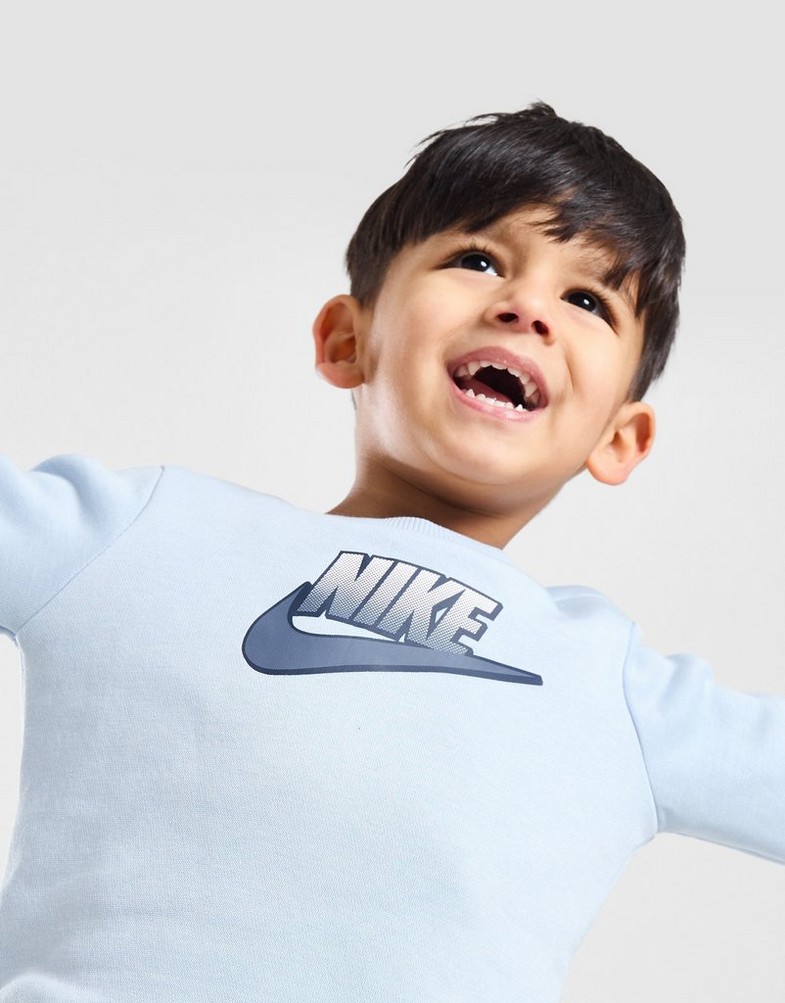 Дитячі спортивні костюми NIKE КОМПЛЕКТ FADE LGO CRWST L'BLU$ 66L920-U1W Блакитний