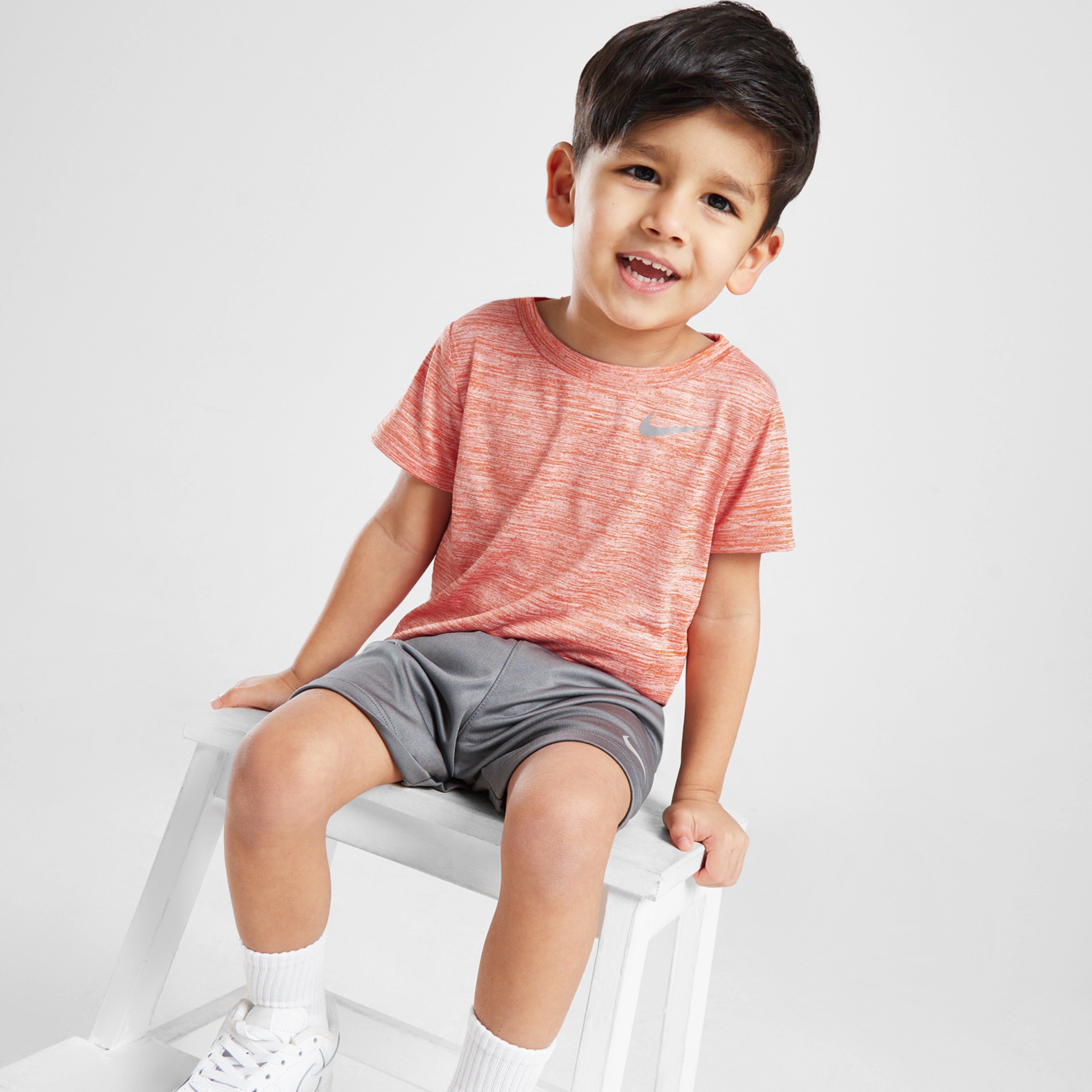 Gyerek melegítőszett NIKE SZETT MILER T/SHT ORG/GRY