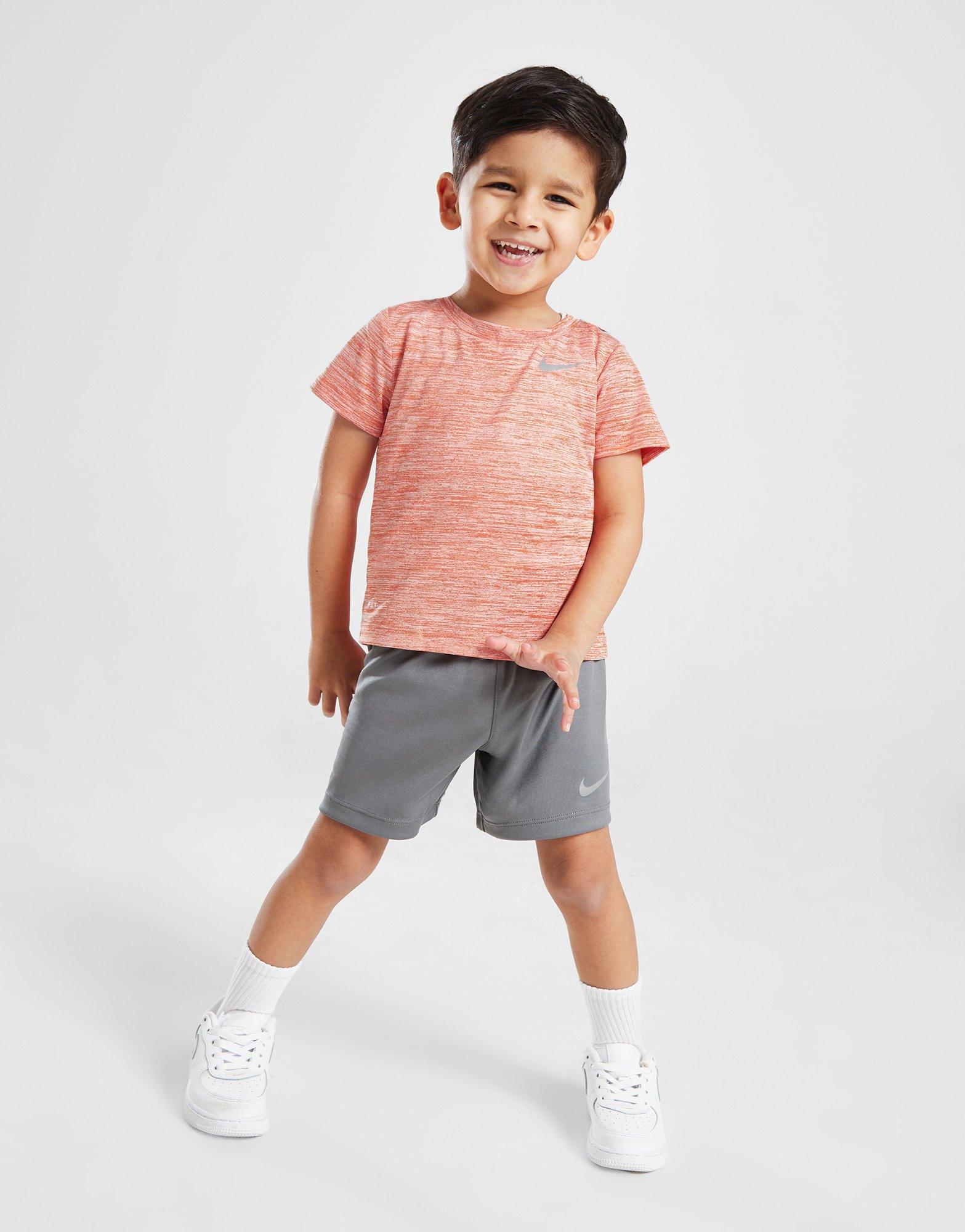 Дитячі спортивні костюми NIKE КОМПЛЕКТ MILER T/SHT ORG/GRY 66K750-N1Y Помаранчевий