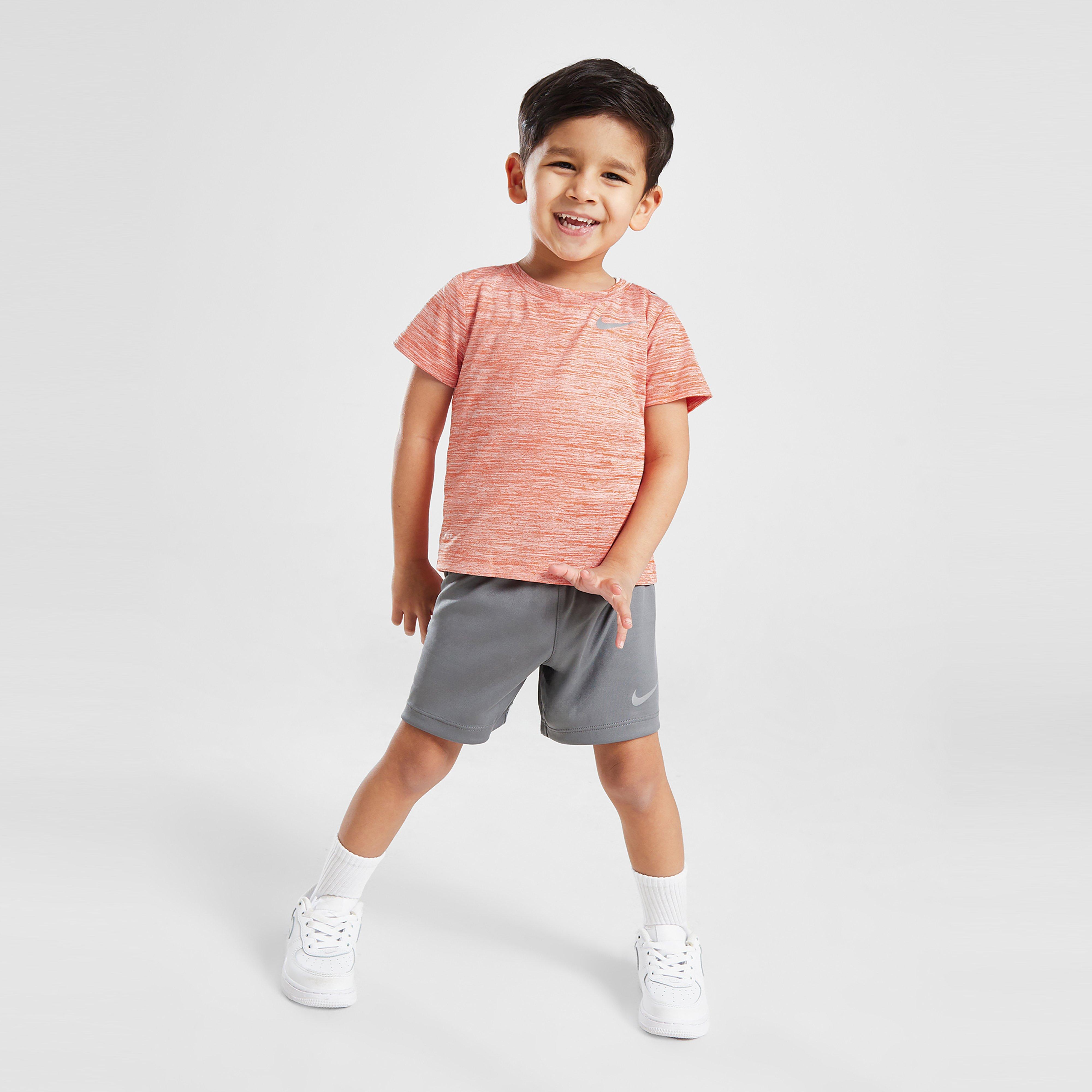 Gyerek melegítőszett NIKE SZETT MILER T/SHT ORG/GRY