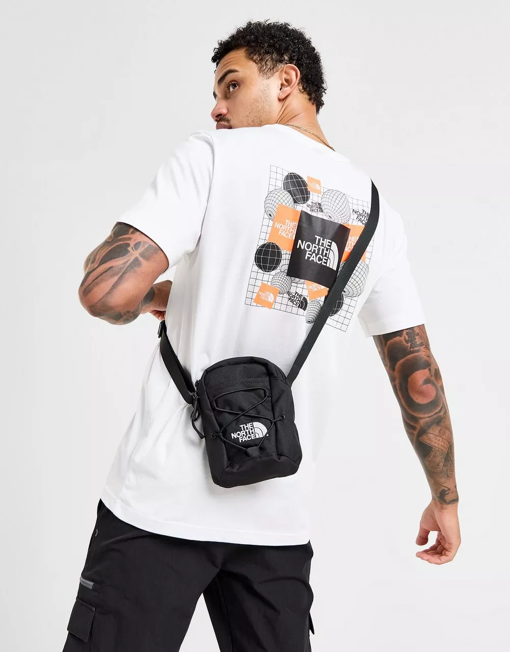 THE NORTH FACE ФУТБОЛКА ENERGY BK T WH/BLK, фото 1 з 5
