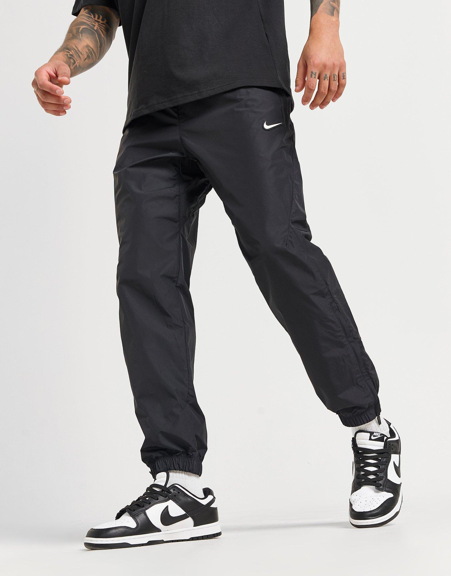Nike Nadrág M Nrg Nocta Cs Trk Pant Wvn
