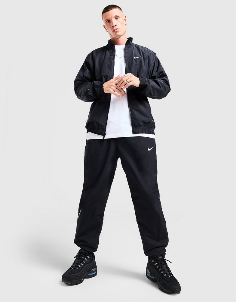 NIKE PANTALONI M NRG NOCTA CS TRK WVN Bărbați Negru FN7668-010