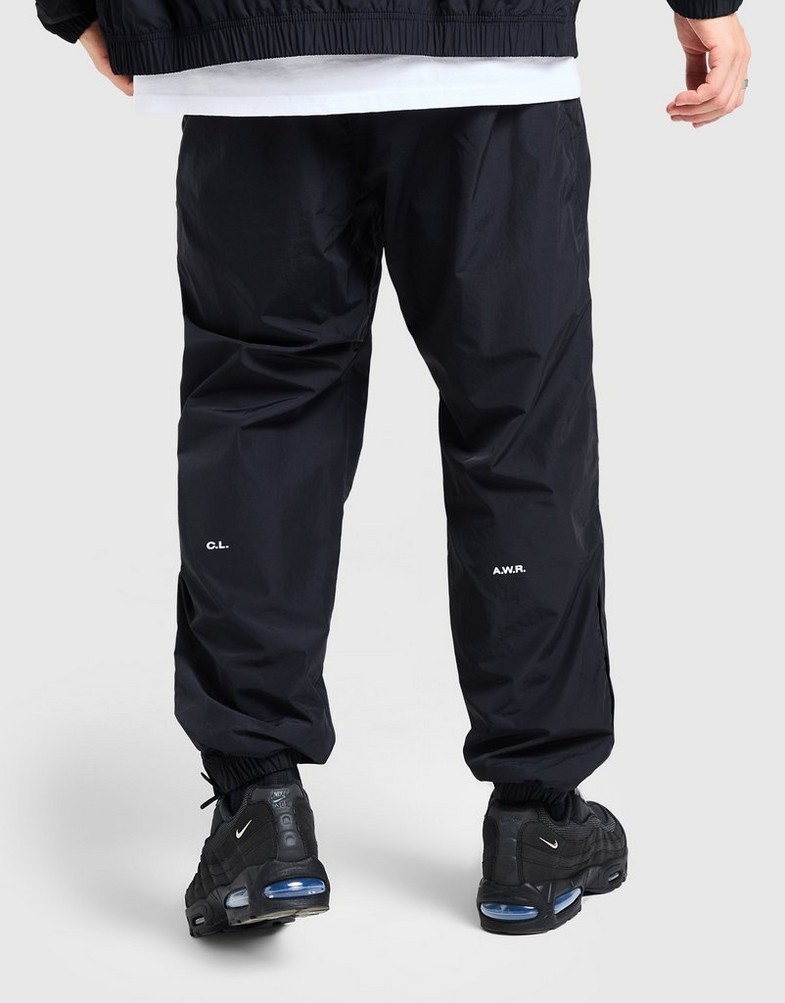 NIKE PANTALONI M NRG NOCTA CS TRK WVN Bărbați Negru FN7668-010