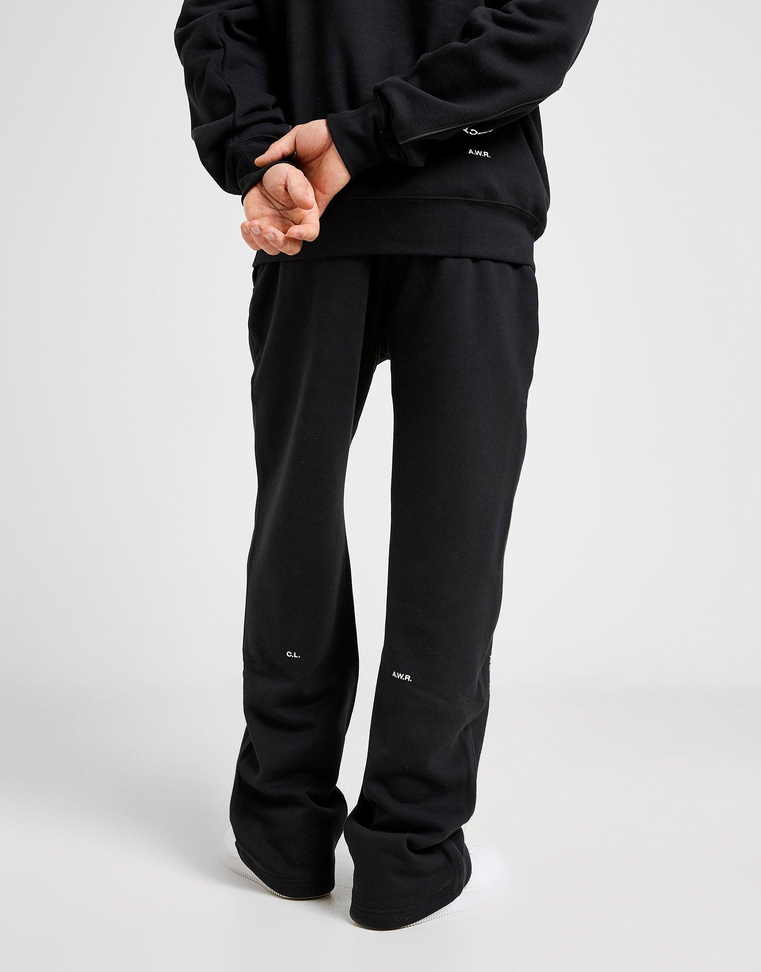 Pánske nohavice NIKE NOHAVICE  M NRG NOCTA CS PANT FLC OH FZ4675-010 Čierna