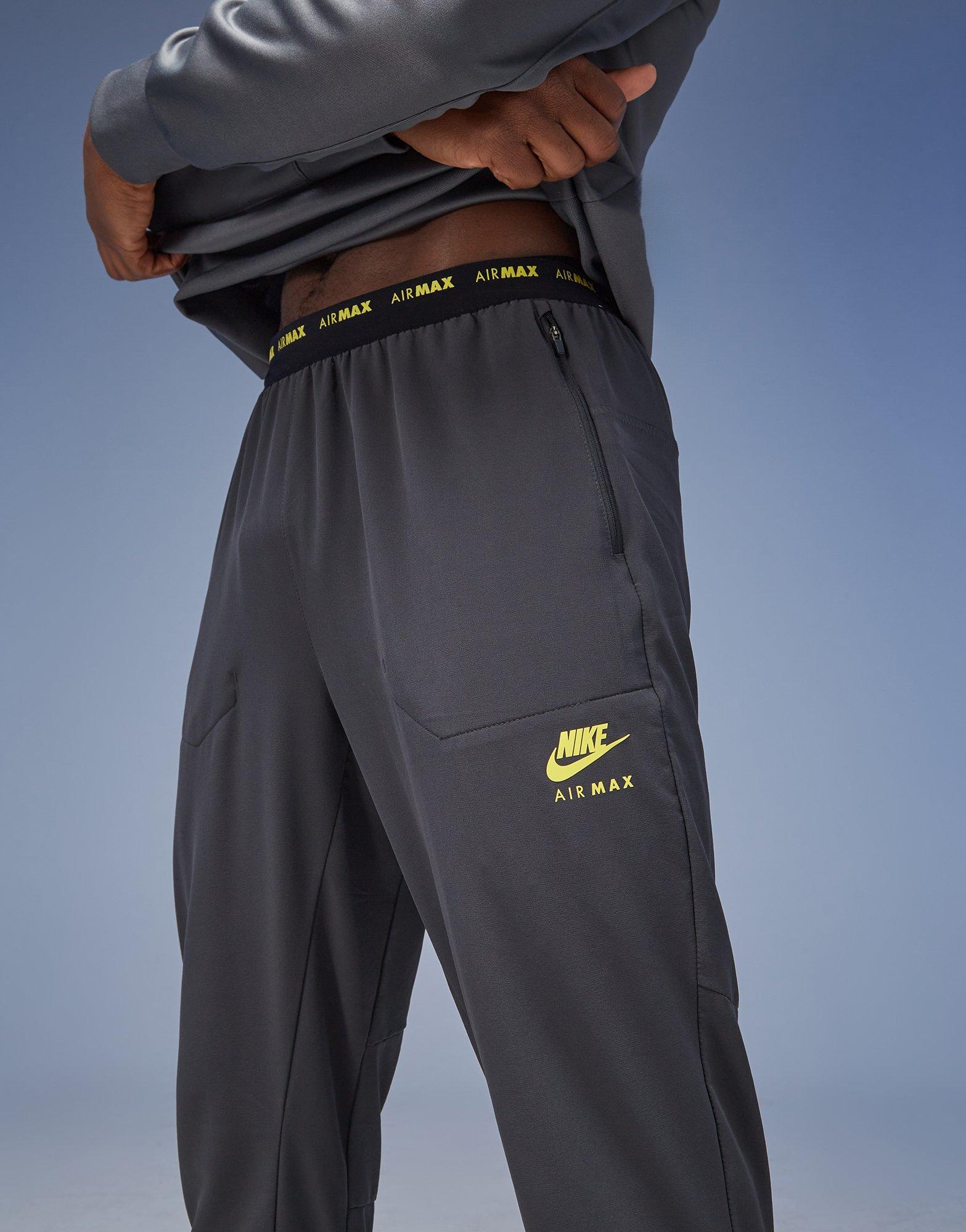 Чоловічі штани NIKE ШТАНИ M NSW AIR MAX TC ST WV PANT AIR MAX FV5598-060 Сірий