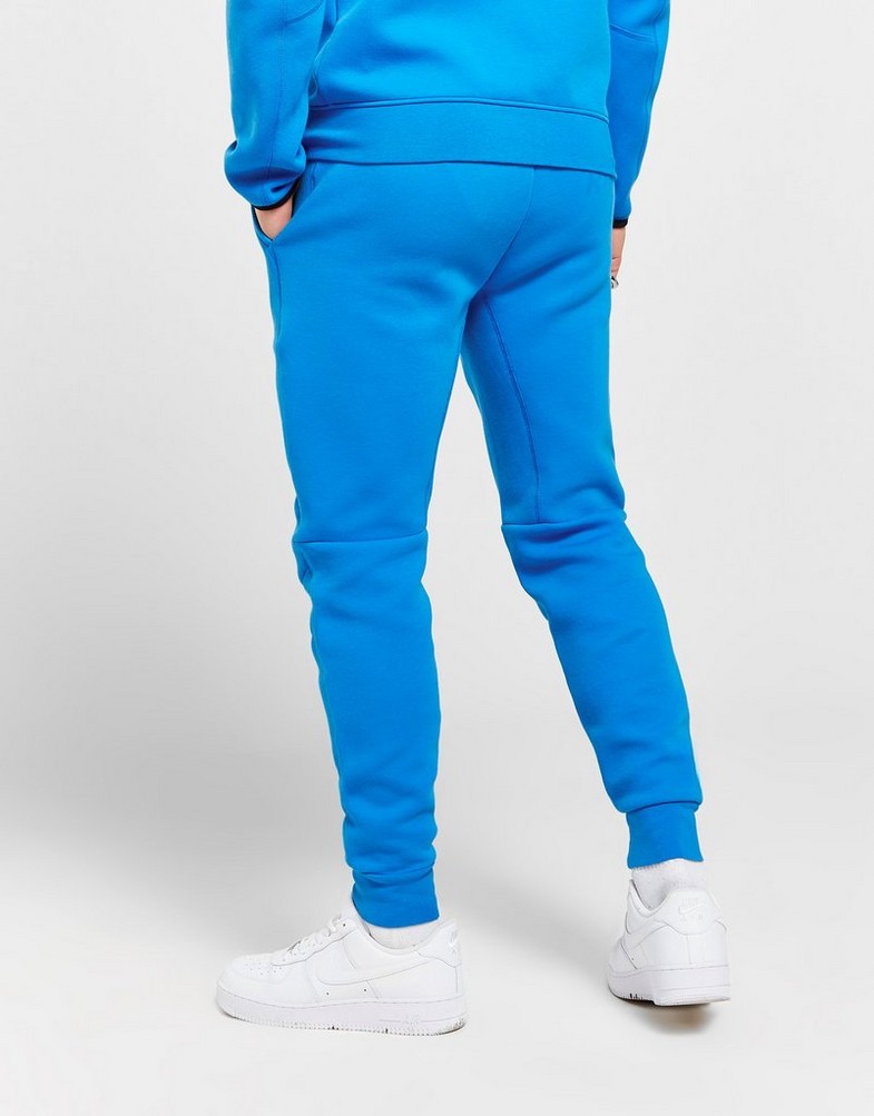 Pánske nohavice NIKE NOHAVICE  M NK TCH FLC JGGR TECH FB8002-435 Modrá