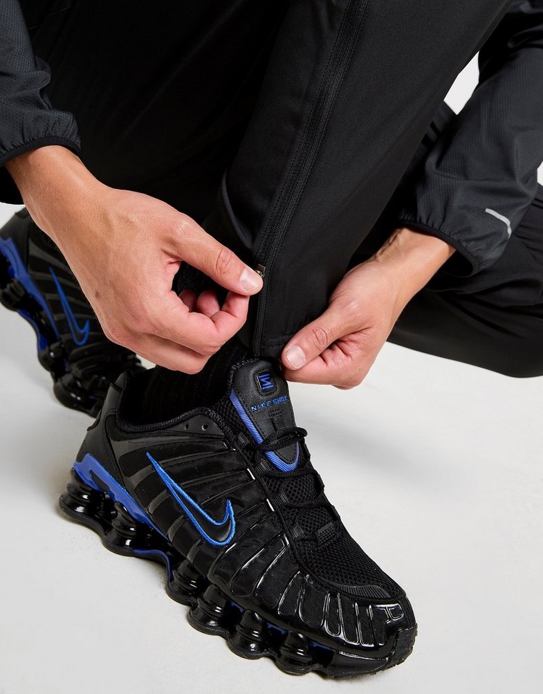 Чоловічі штани NIKE ШТАНИ M NK DF CHALLENGR WVN PANT RUNNING FQ4780-010 Чорний