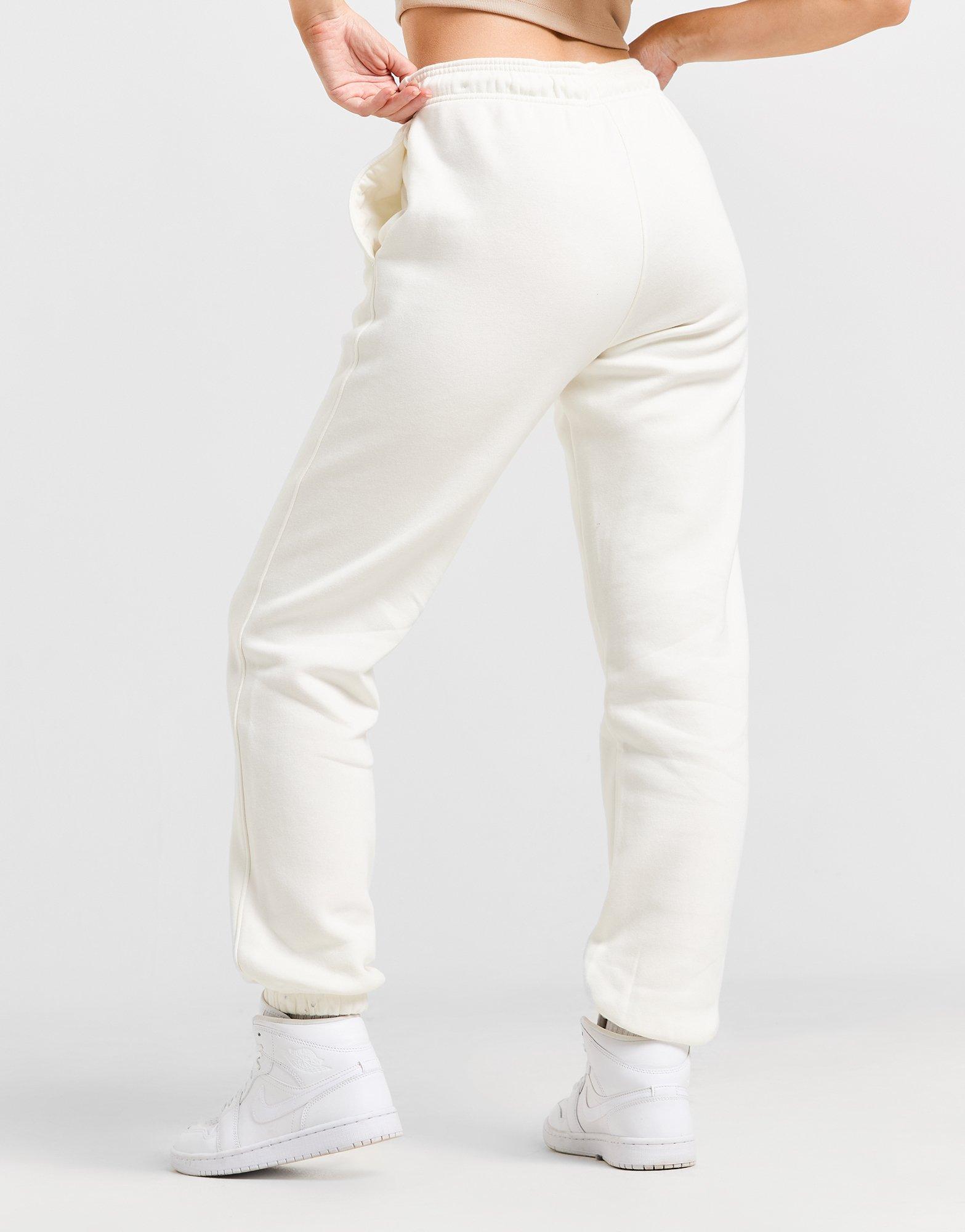 Dámské kalhoty JORDAN KALHOTY  W J BRKLN FLC PANT 2 FN4494-133 Béžová