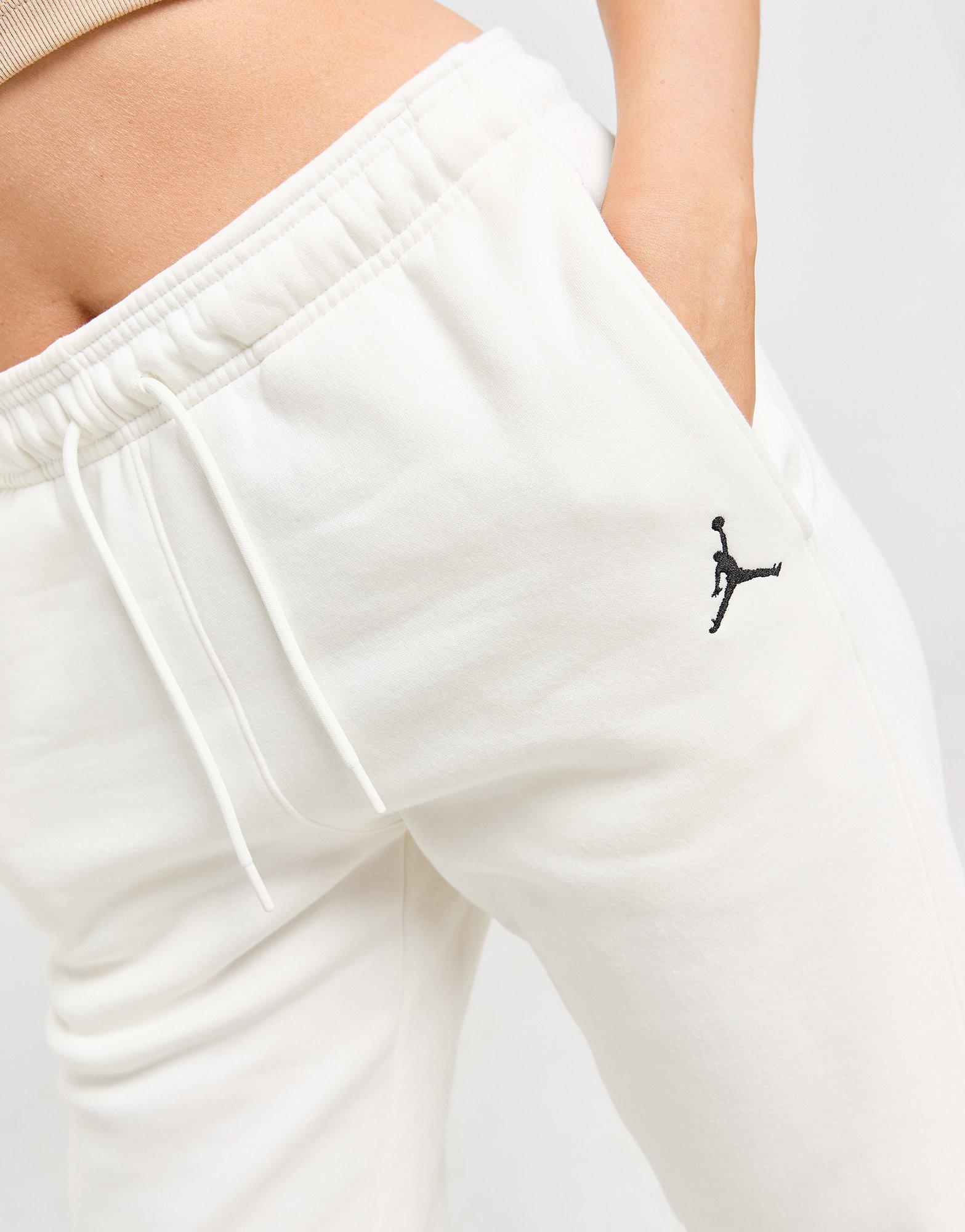 Dámské kalhoty JORDAN KALHOTY  W J BRKLN FLC PANT 2 FN4494-133 Béžová