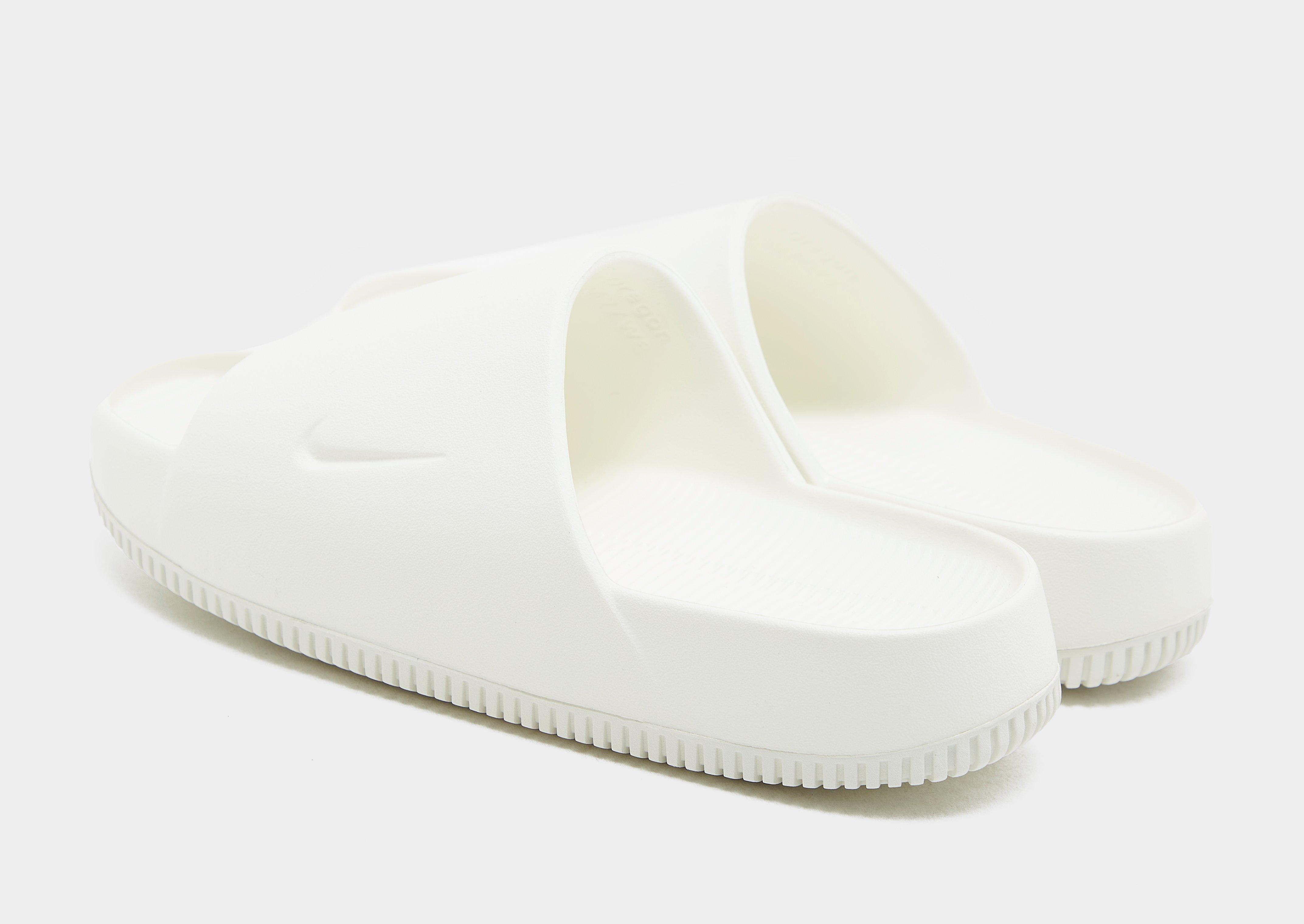 Šlepetės moterims NIKE CALM SLIDE DX4816-100 Rusva