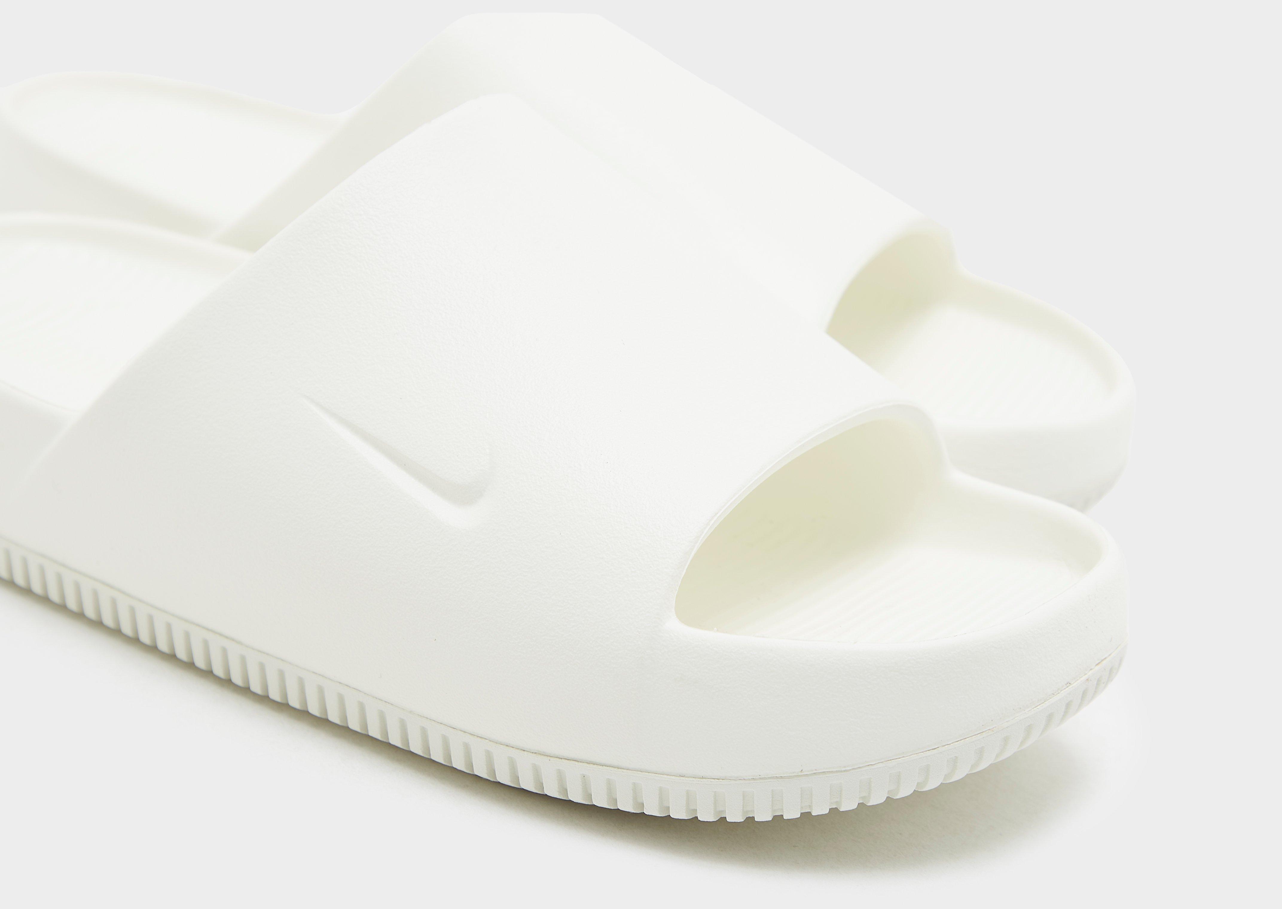 Šlepetės moterims NIKE CALM SLIDE DX4816-100 Rusva