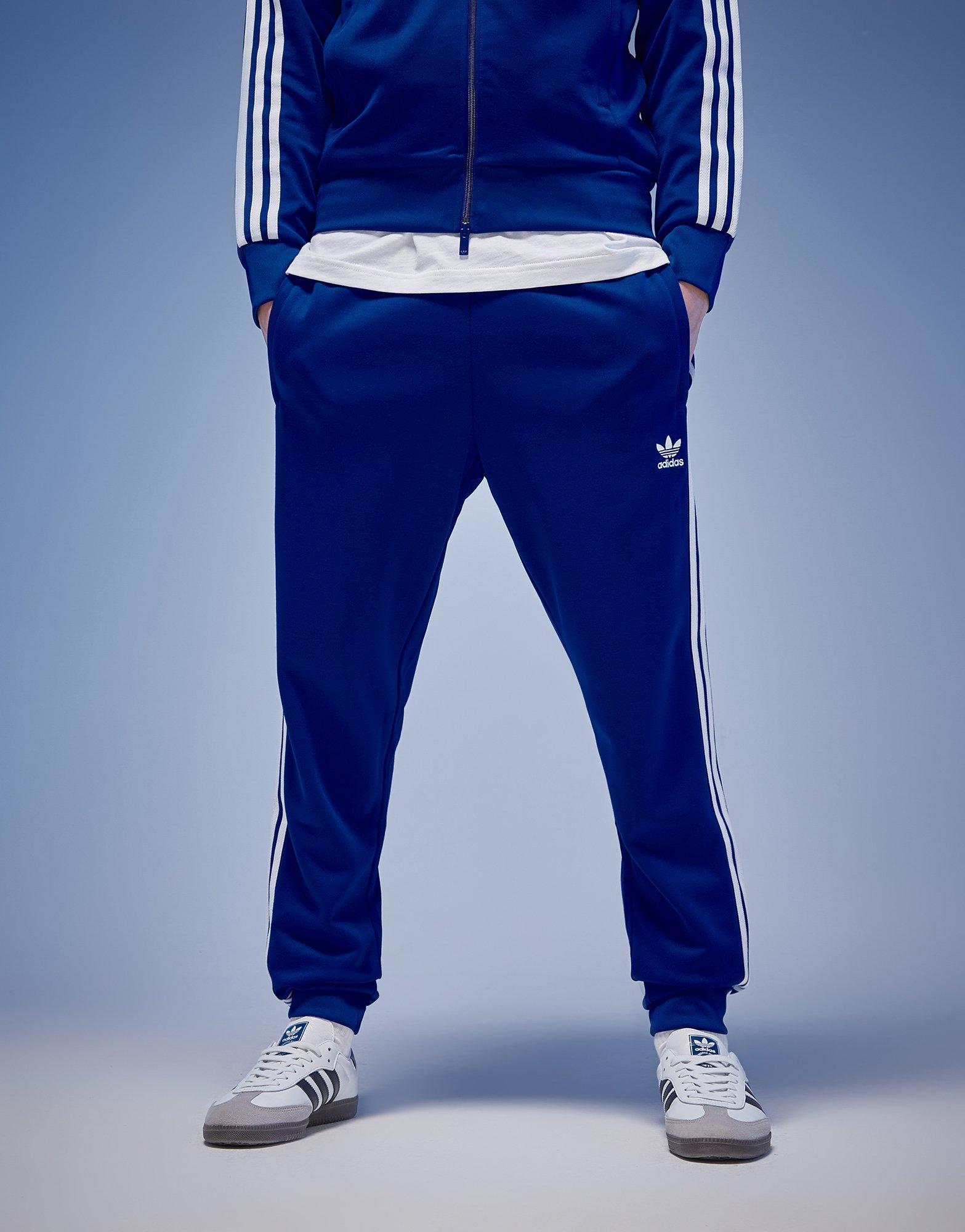 Pánské kalhoty ADIDAS KALHOTY  SST TP ORIGINALS POLY CORE IZ0032 Modrá