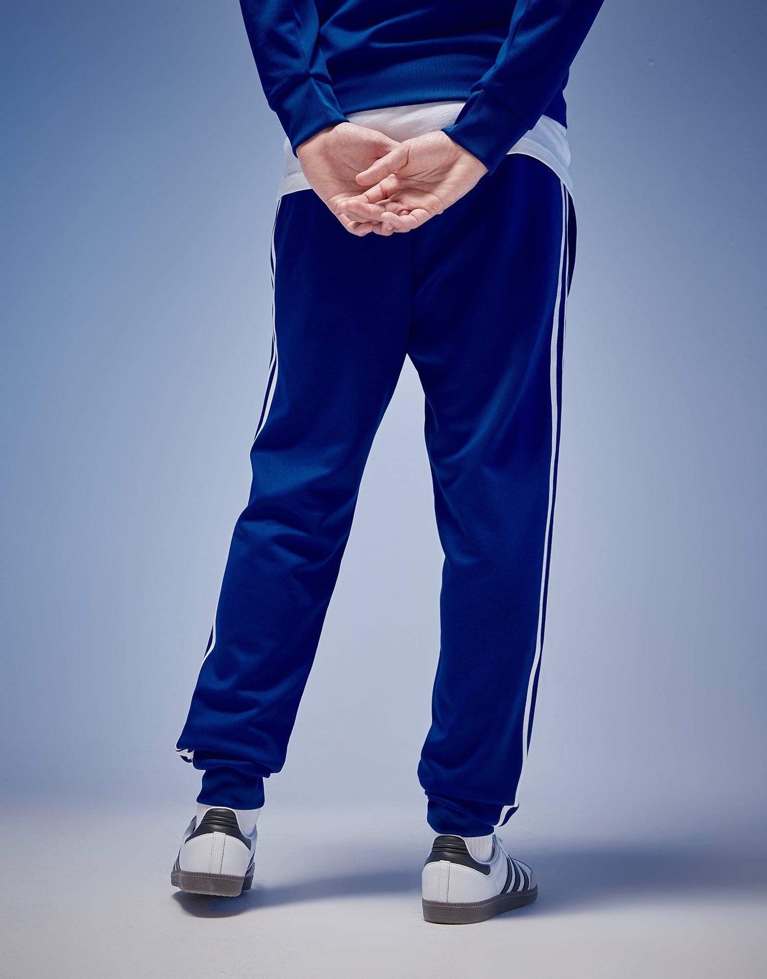 Pánské kalhoty ADIDAS KALHOTY  SST TP ORIGINALS POLY CORE IZ0032 Modrá