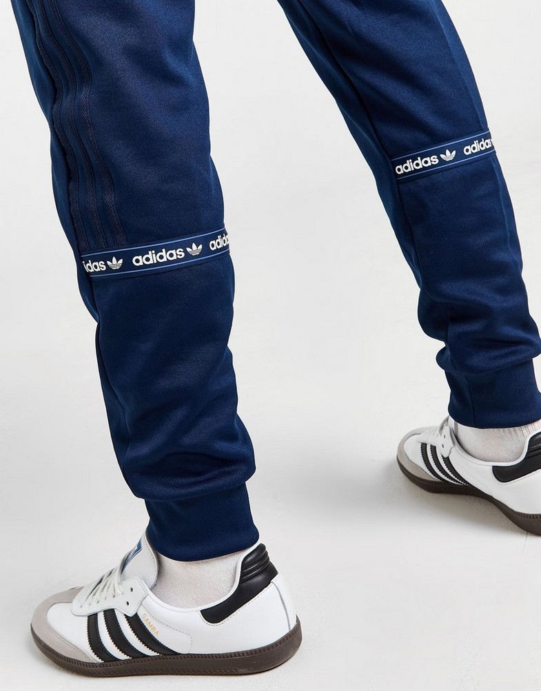 ADIDAS SPODNIE NY TAPE PANT POLY TAPE IW6428 Granatowy
