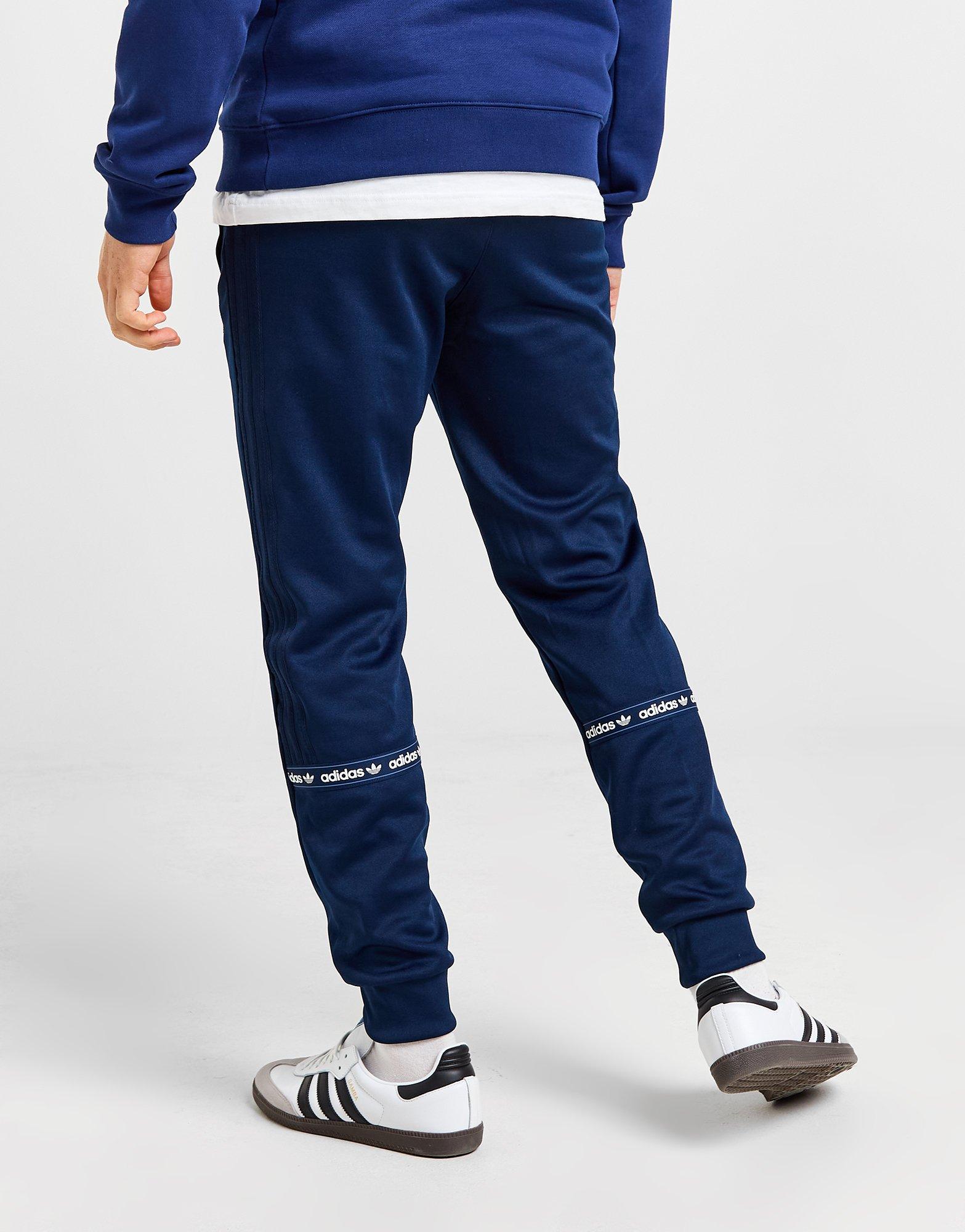 Muške hlače ADIDAS HLAČE NY TAPE PANT POLY TAPE IW6428 tamnoplava
