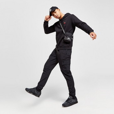Pantaloni pentru bărbați ADIDAS PANTALONI  CM WOVEN PANT GRAPHIC