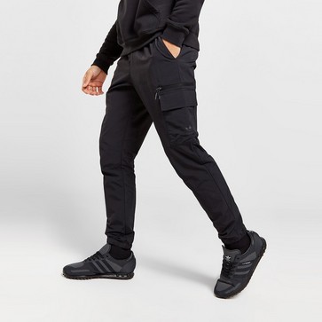 Pantaloni pentru bărbați ADIDAS PANTALONI  CM WOVEN PANT GRAPHIC