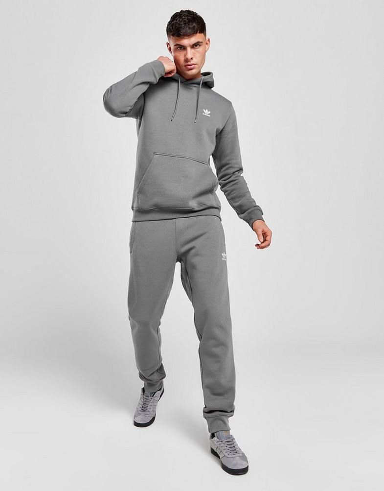 Vyriškas džemperis ADIDAS DŽEMPERIS SU GOBTUVU ESSENTIAL HOODY ORIGINALS CORE IZ0023 Pilka