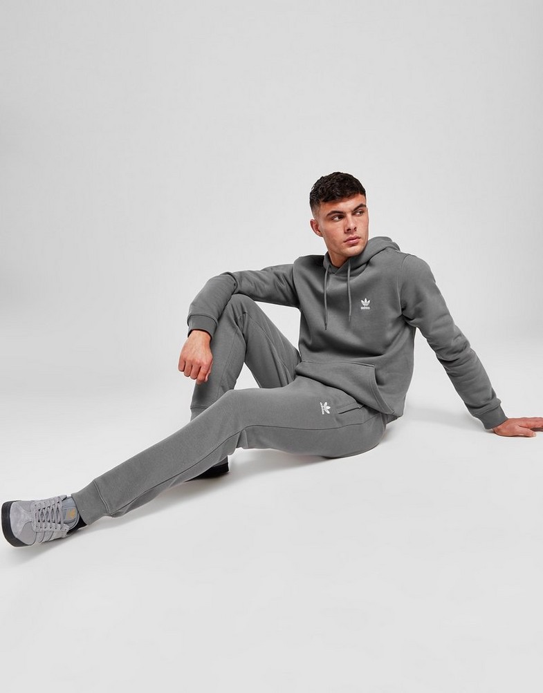 Чоловічі штани ADIDAS ШТАНИ ESSENTIALS PANT ORIGINALS CORE IZ0019 Сірий