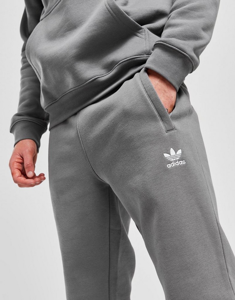 Чоловічі штани ADIDAS ШТАНИ ESSENTIALS PANT ORIGINALS CORE IZ0019 Сірий
