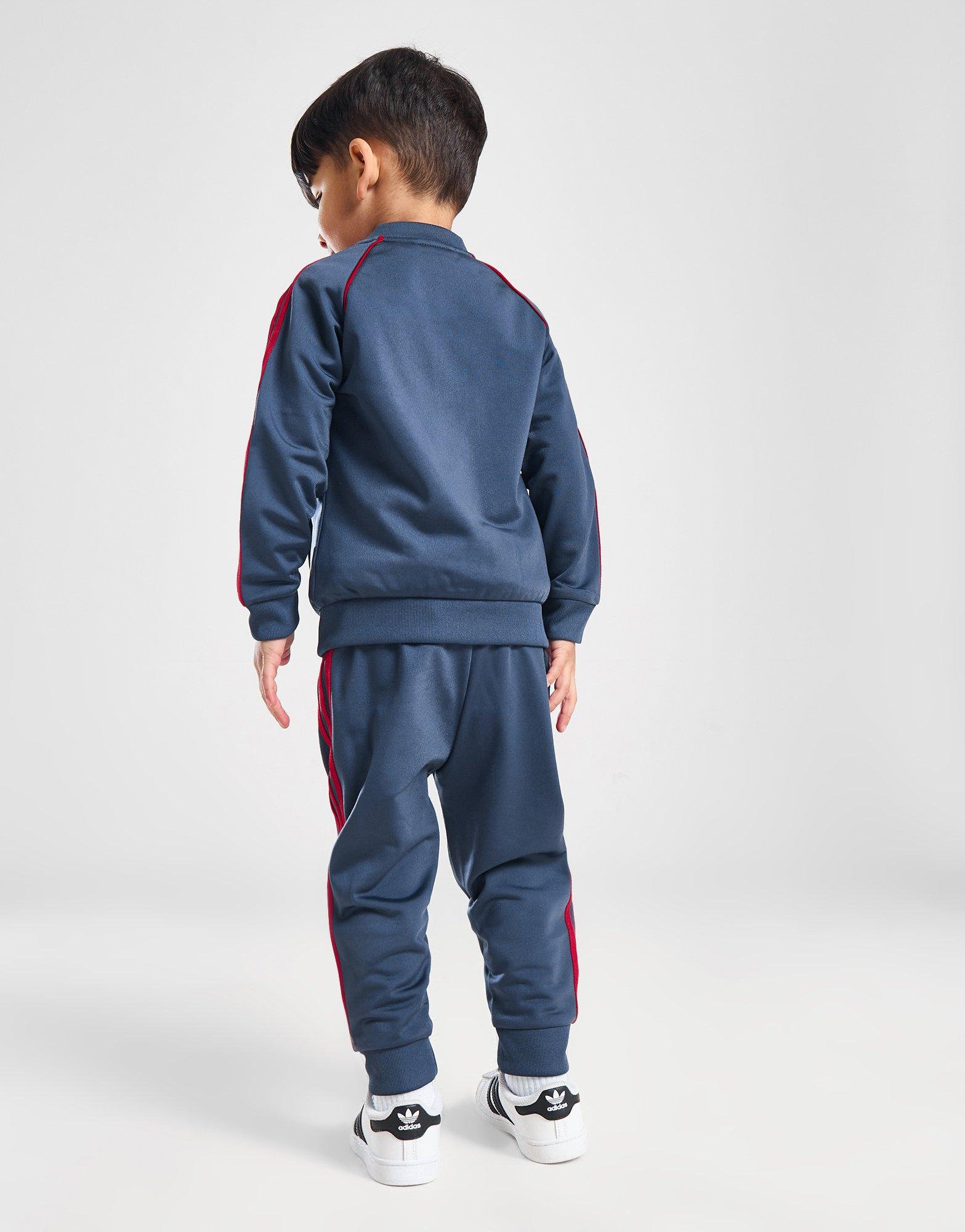 Vaikiški sportiniai kostiumai ADIDAS KOMPLEKTAS SST TRACKSUIT B IX3100 Tamsiai mėlyna