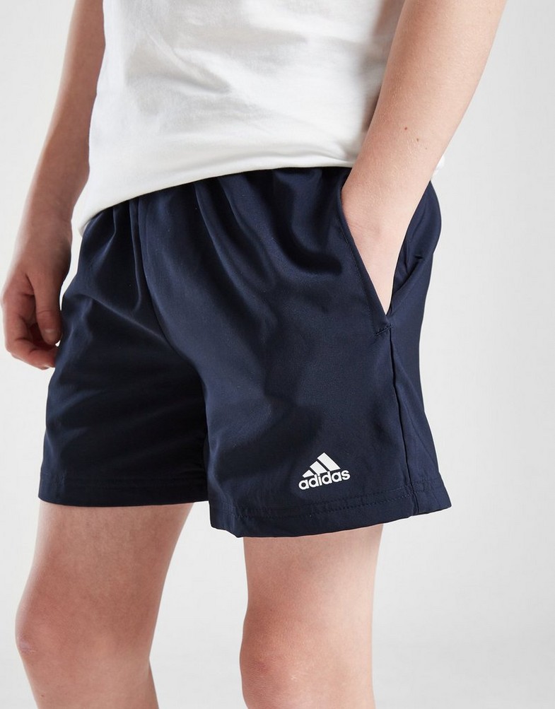 Krótkie spodenki, szorty dziecięce ADIDAS SZORTY CORE WVN SHRT NNVY/WHT