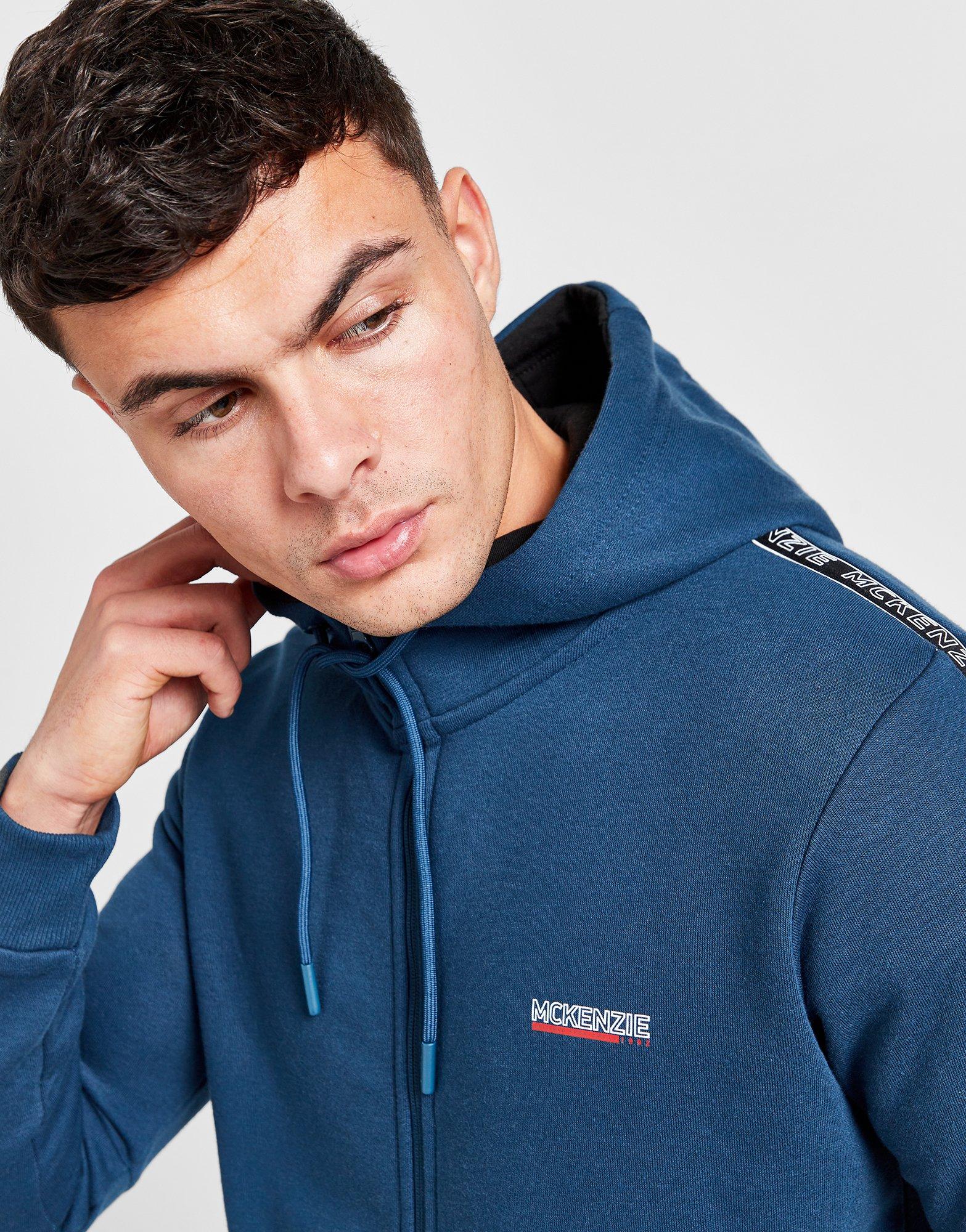 Muški gornji dio trenirke MCKENZIE VESTA RASKOPČANA S KAPULJAČOM ESS TAPE . MCKTM16304025 tamnoplava