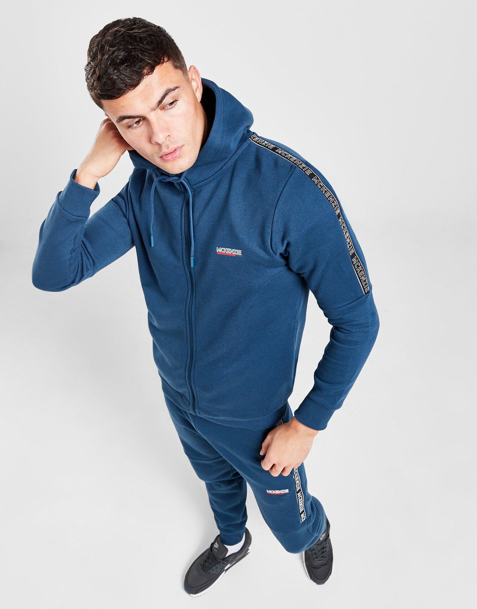 Muški gornji dio trenirke MCKENZIE VESTA RASKOPČANA S KAPULJAČOM ESS TAPE . MCKTM16304025 tamnoplava