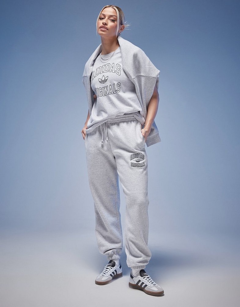 Dámske nohavice ADIDAS NOHAVICE  JOGGERS IZ0182 Sivá
