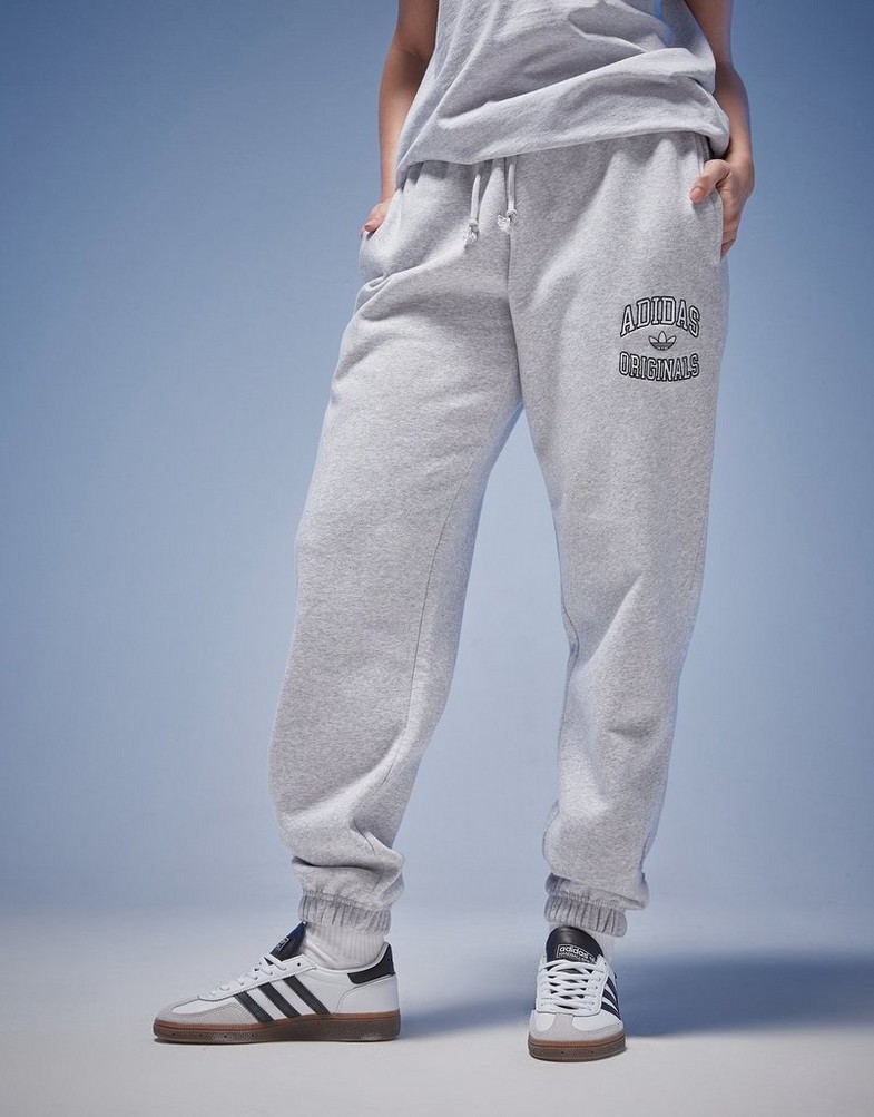 Dámske nohavice ADIDAS NOHAVICE  JOGGERS IZ0182 Sivá