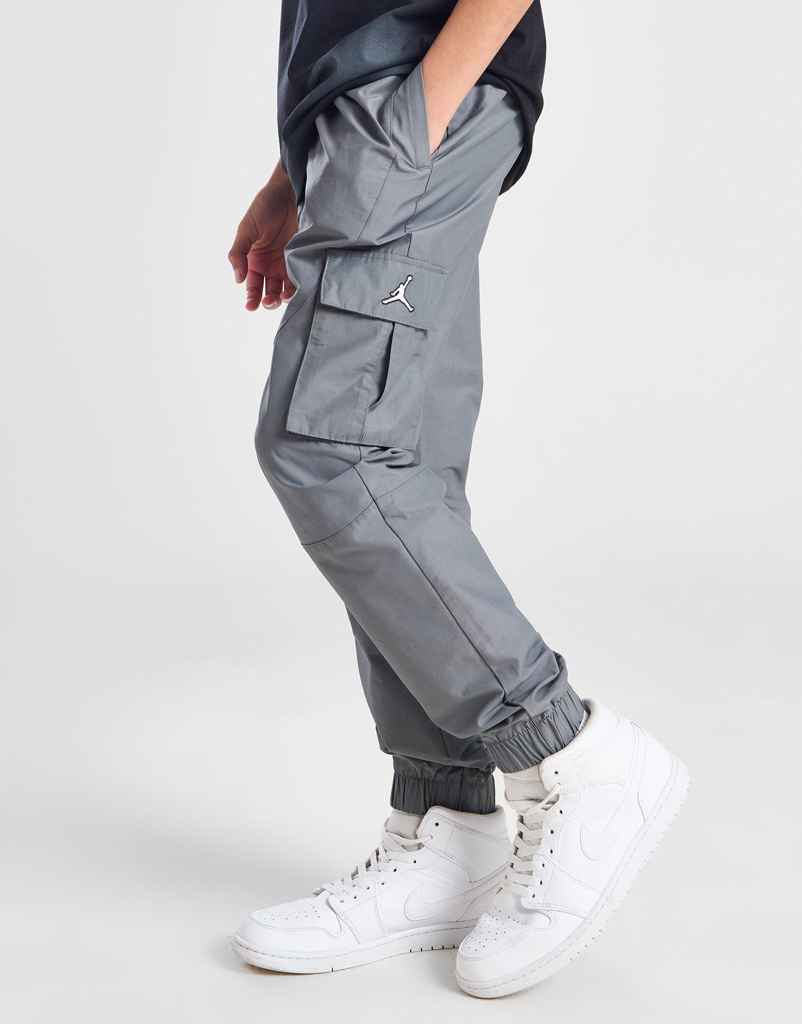 Детски панталон JORDAN ПАНТАЛОНИ WVN JMPN CRGO GRY/WH B 95A488-M19 Сив