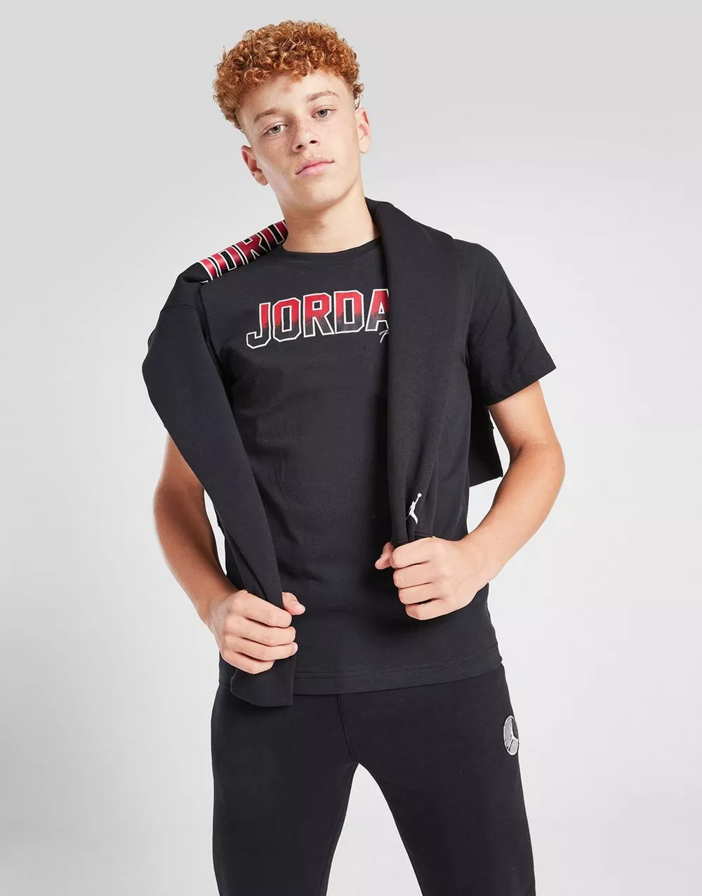 NikeHad JORDAN ФУТБОЛКА COLG PATCH T BLK/RD B, фото 1 з 5