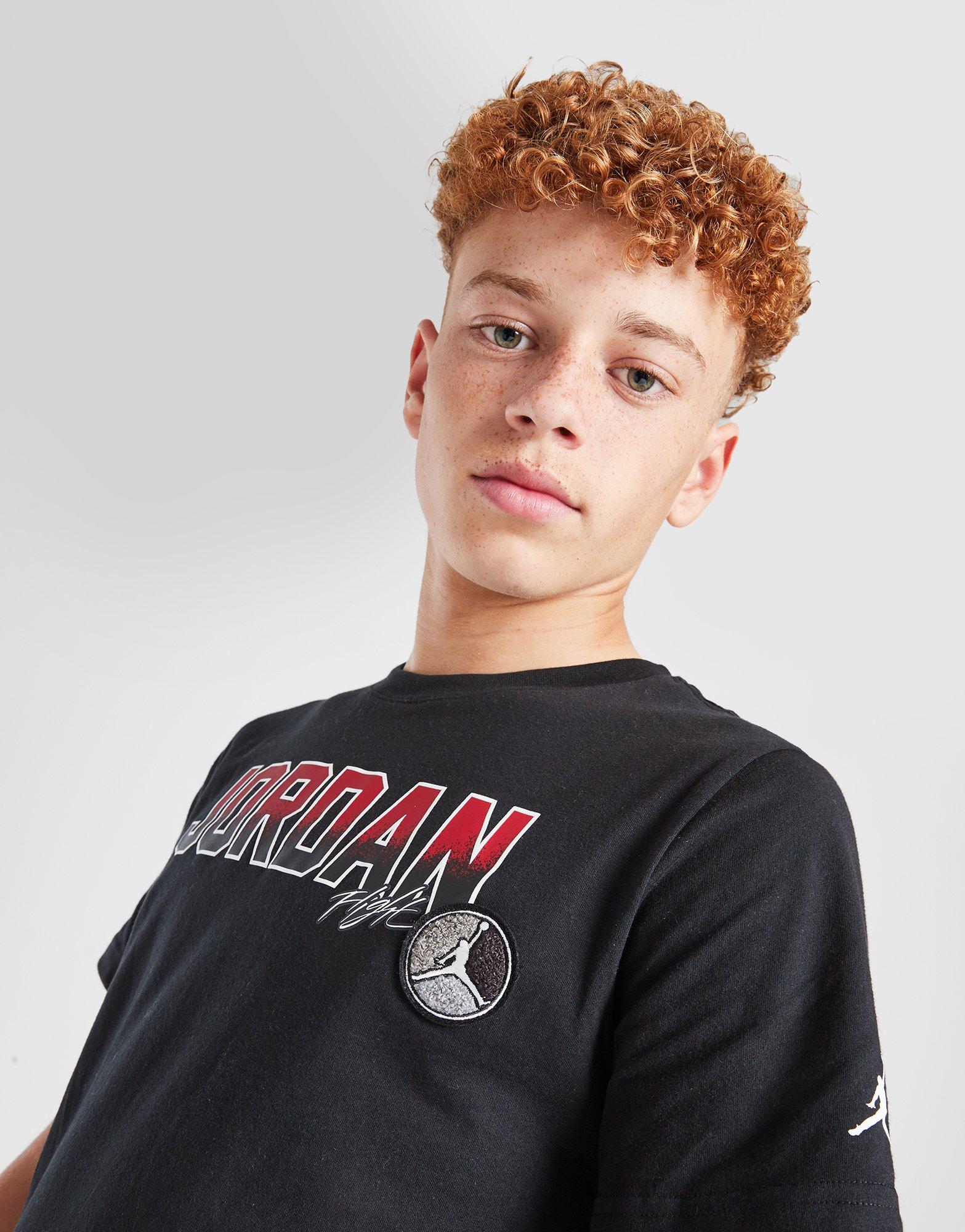 Detské tričko JORDAN TRIČKO COLG PATCH T BLK/RD B 95D444-023 Černá