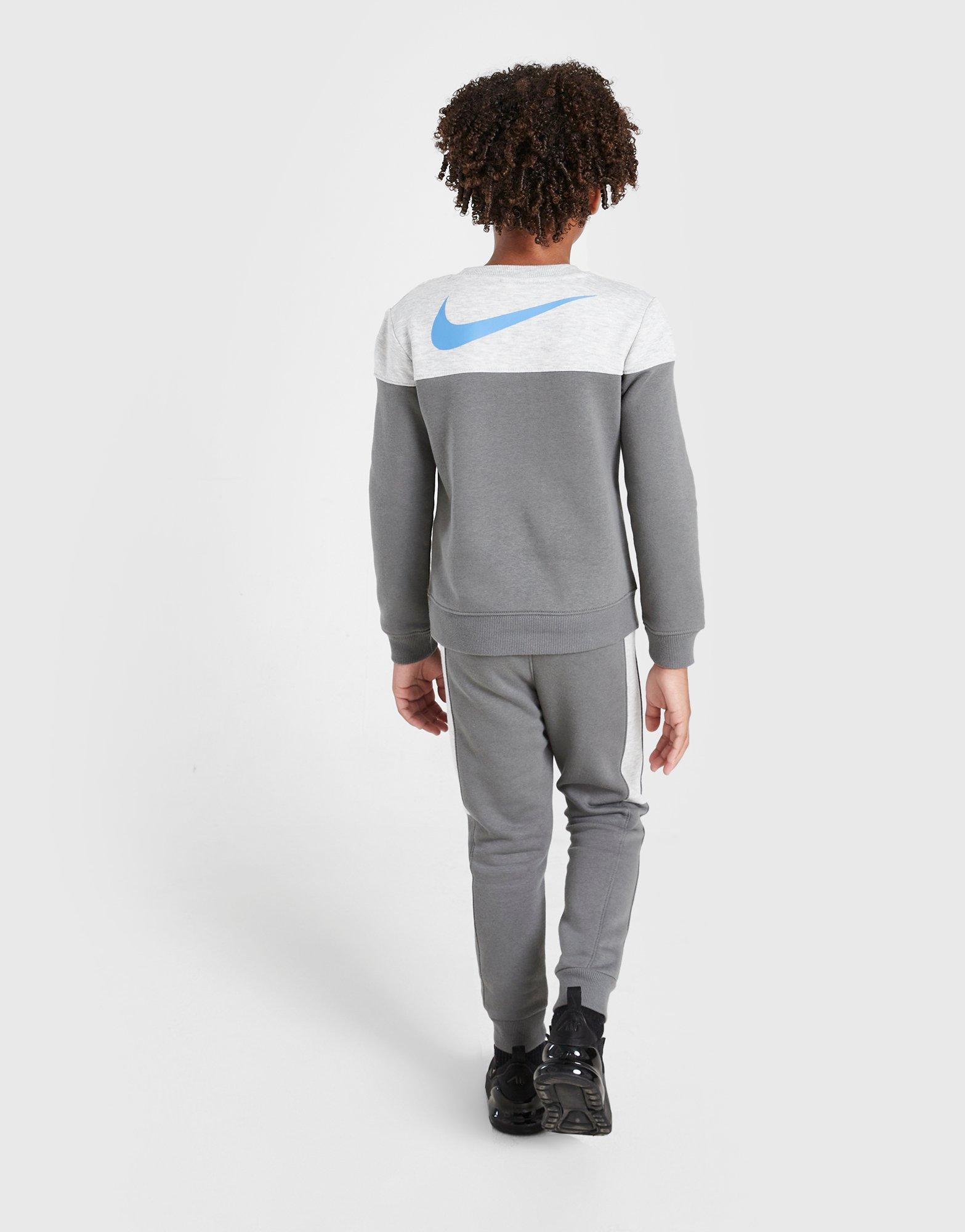 Gyerek melegítőszett NIKE SZETT C/B FUTRA CRW ST GRY B 86M402-M19 Szürke