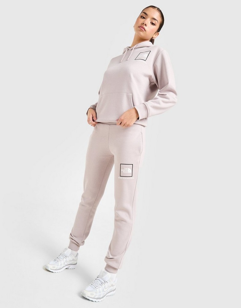 Жіночі штани THE NORTH FACE ШТАНИ OUTLINE JOGGER MOON/WH NF0A8AJ41OA1 Сірий