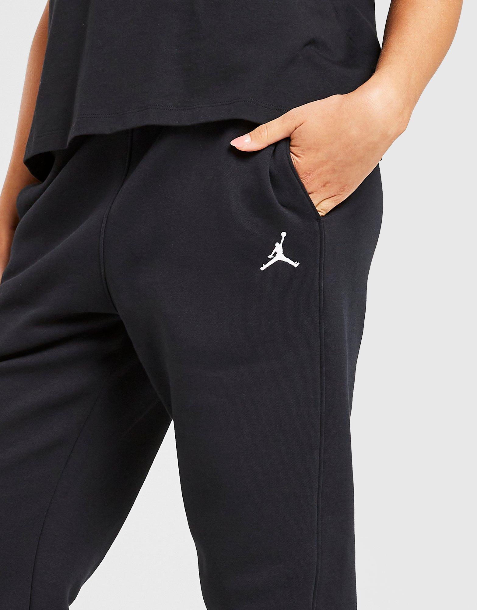 Pantaloni pentru femei PANTALONI  W JORDAN BRKLN FLC PANT 24 FV7077-010 Negru