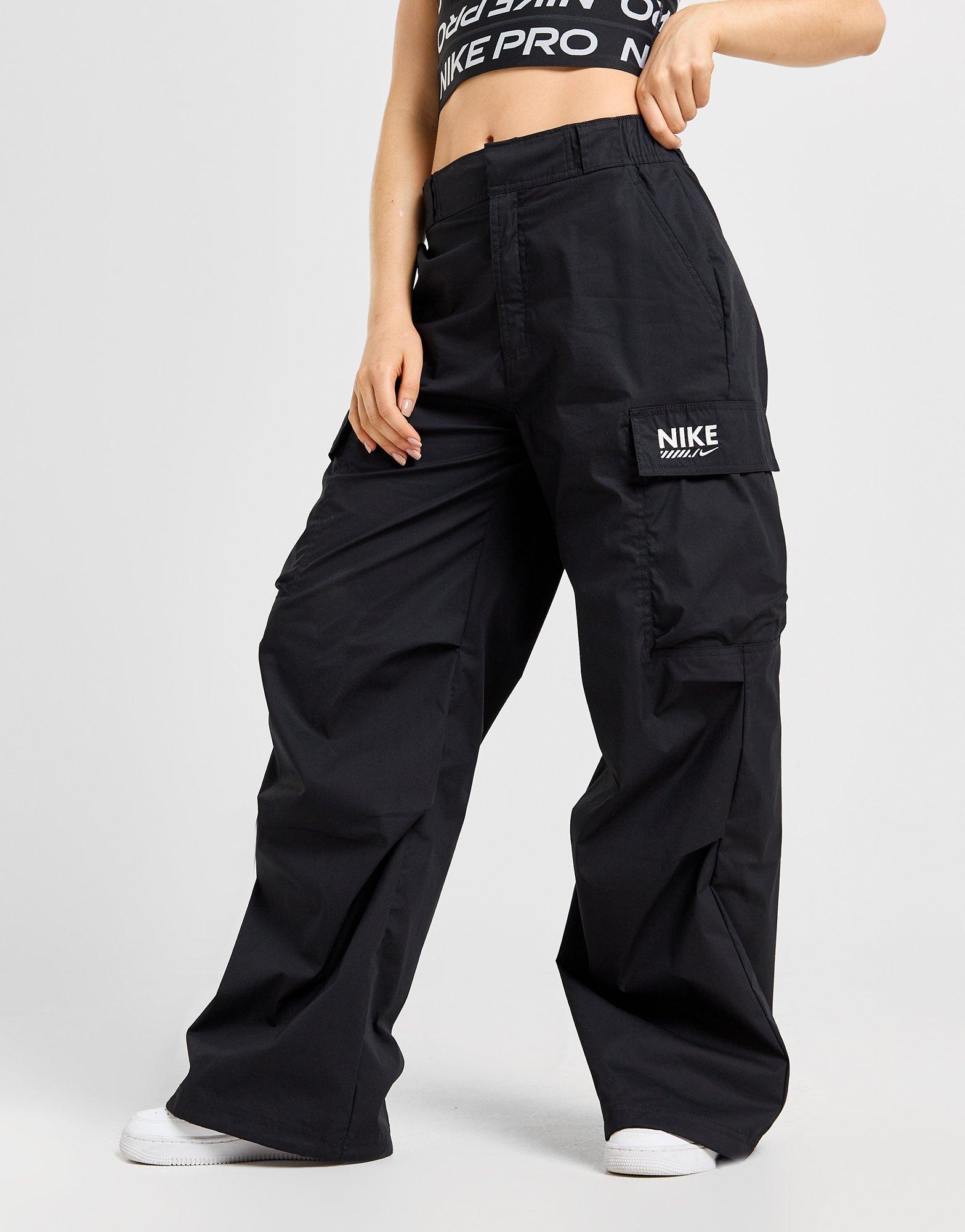 Moteriškos kelnės NIKE KELNĖS W NSW WOVEN OS PANT HR GLS HM4322-010 Juoda