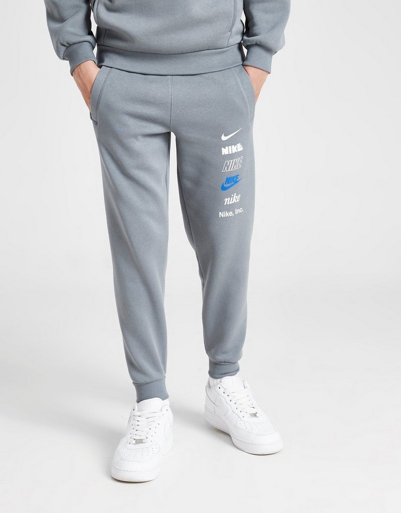 Дитячі штани NIKE ШТАНИ K NSW CLUB FLC JGGR MLOGO B HQ0973-084 Сірий