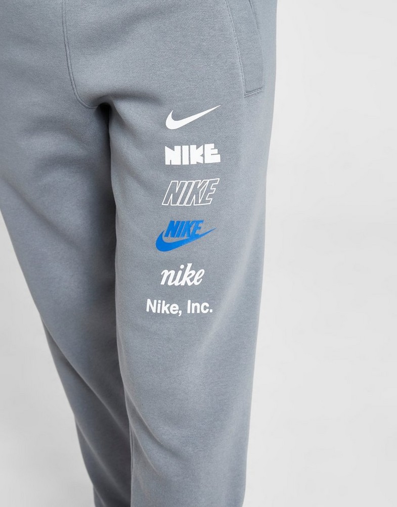 Дитячі штани NIKE ШТАНИ K NSW CLUB FLC JGGR MLOGO B HQ0973-084 Сірий