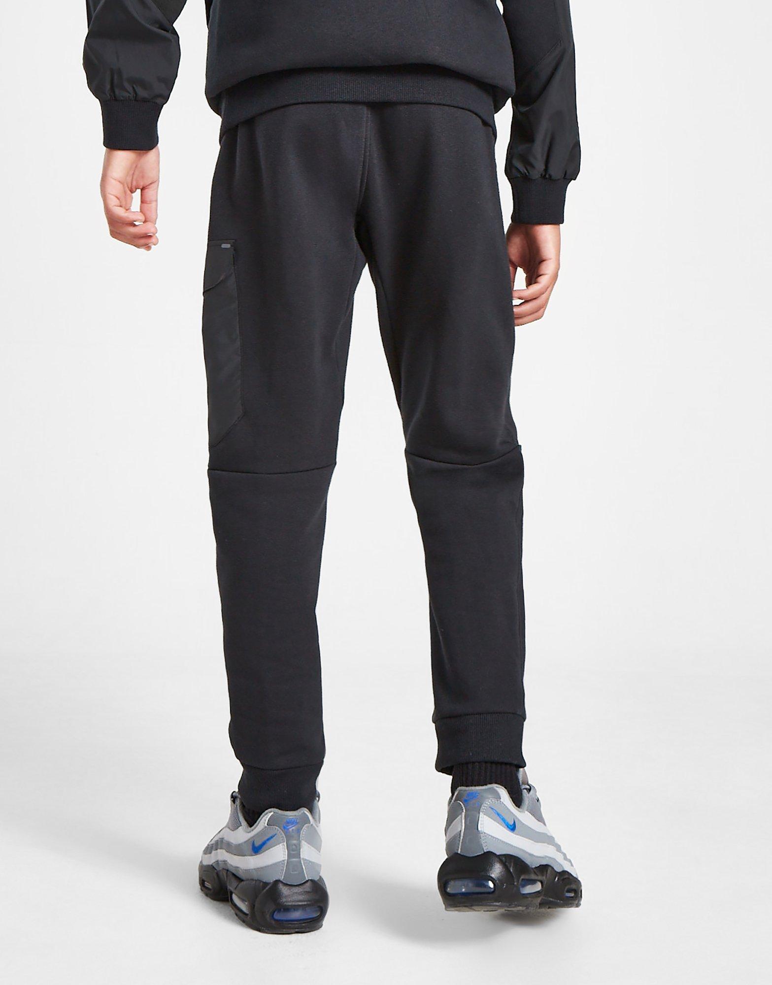 Pantaloni pentru copii NIKE PANTALONI  K NSW CITY UTILITY EO FLC PANT FZ5022-010 Negru