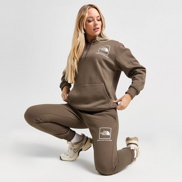 Pantaloni pentru femei THE NORTH FACE PANTALONI  $OUTLINE JOGGER BRN/WH