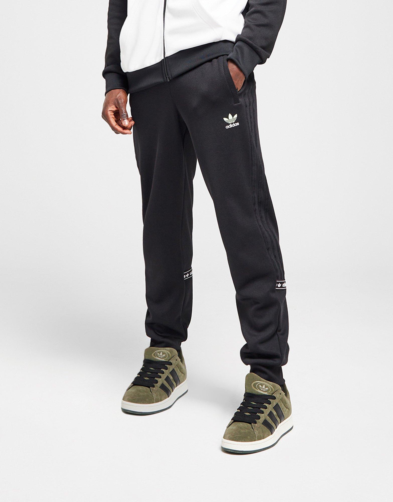 ADIDAS SPODNIE TAPE PANT BLK/VOLT JM1181 Czarny