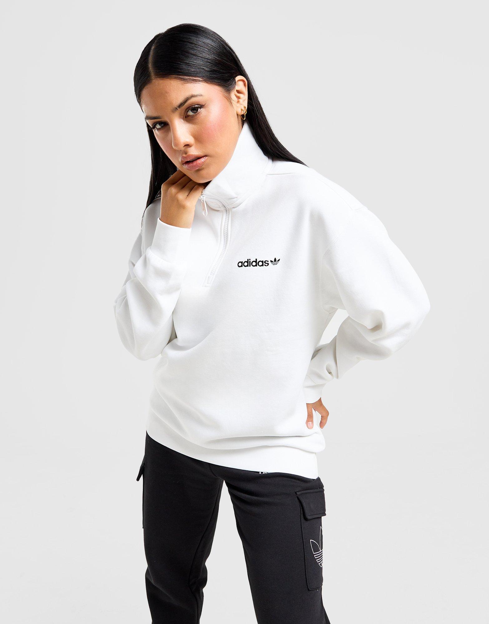 Moteriškas džemperis ADIDAS DŽEMPERIS UŽSEGAMAS SHINE BF 1/4 ZP WHT/BLK JD6334 Balta
