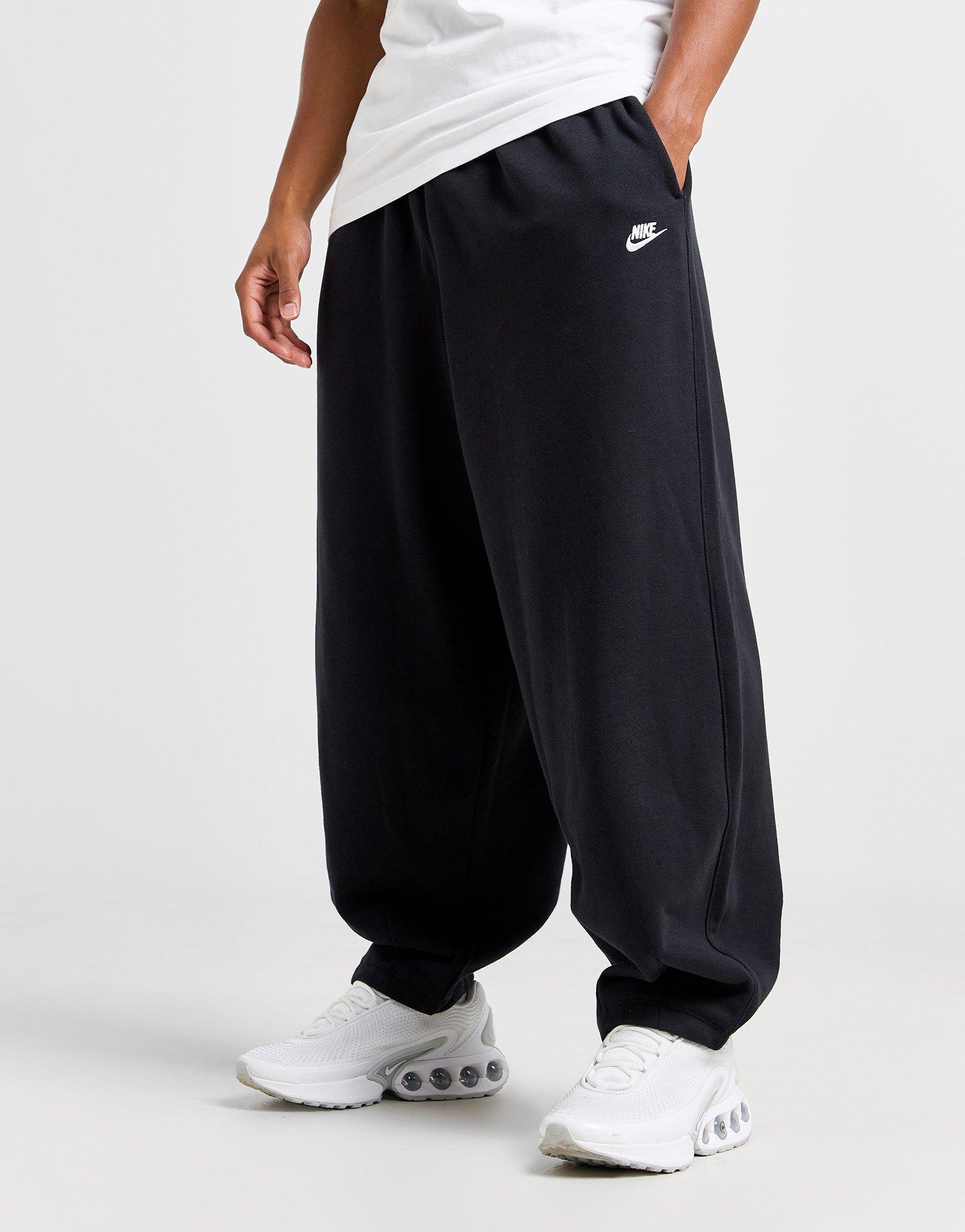 Pánské kalhoty NIKE KALHOTY  M NK CLUB FT OVERSIZED PANT HJ1822-010 Černá